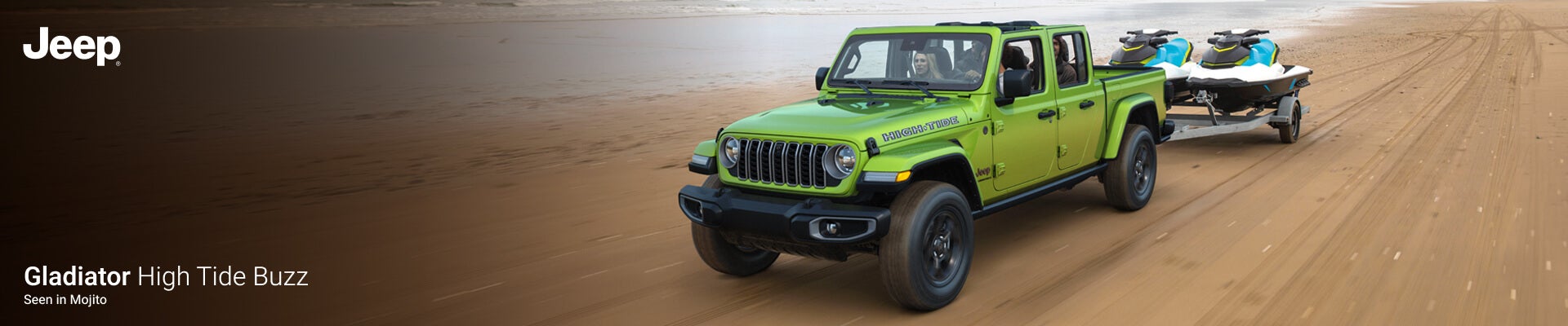 2026 Jeep Gladiator High Tide Buzz in Mojito towing jet skis with four passengers along a sandy beach.