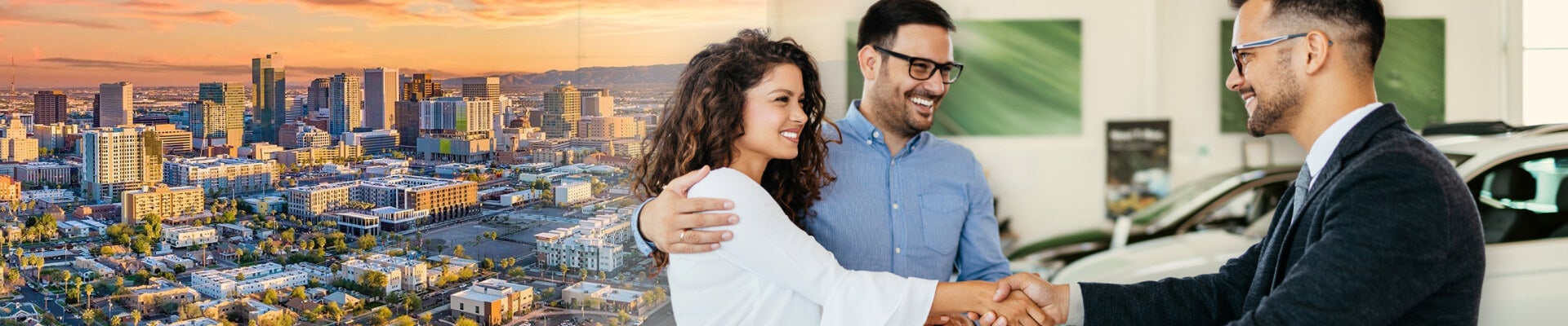 A composite shot of a couple shaking hands with a dealership salesman over an aerial photo of the Pheonix Arizona skyline.